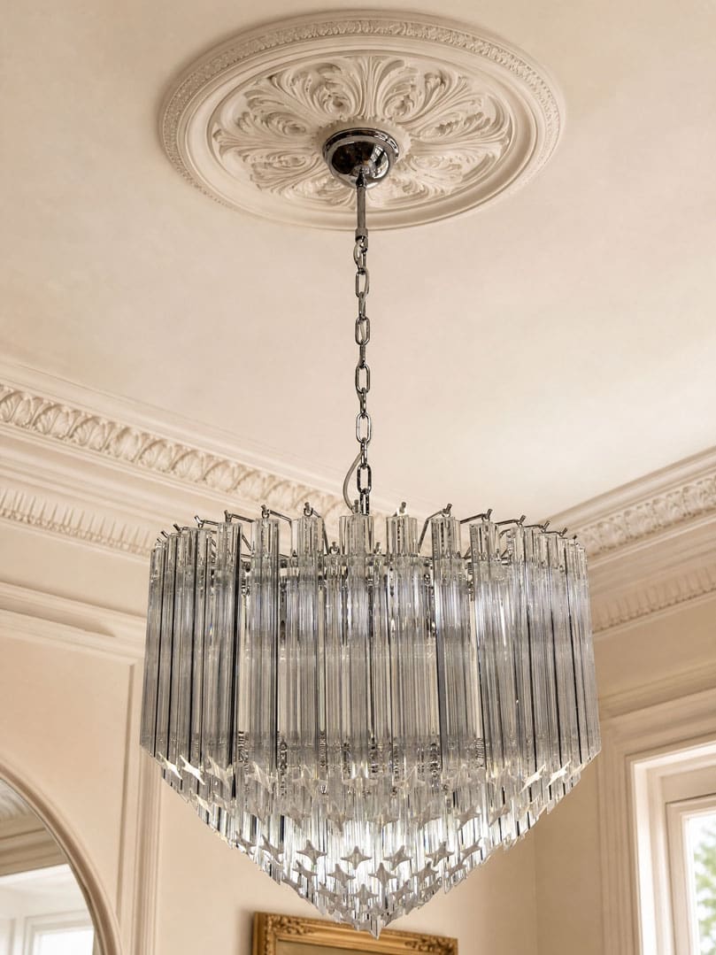 163 transparent quadrie prism chandelier hanging in living room